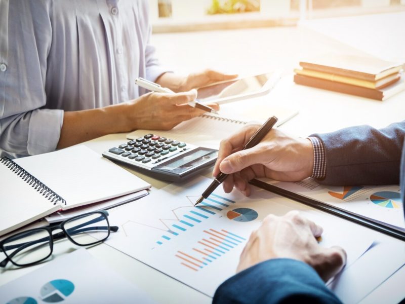 business-man-financial-inspector-secretary-making-report-calculating-checking-balance-internal-revenue-service-inspector-checking-document-audit-concept_1423-128 GnariPro invoice financing for SMEs in Canada