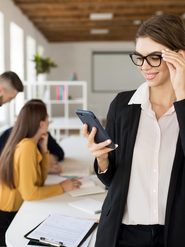 young-smiling-business-woman-in-eyeglasses-and-3RDCAXL-1.jpg
